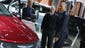 President Obama shares a laugh by the Chrysler Pacifica
