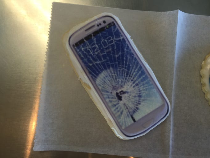 Taylor's Bakery has created a smashed cellphone cookie