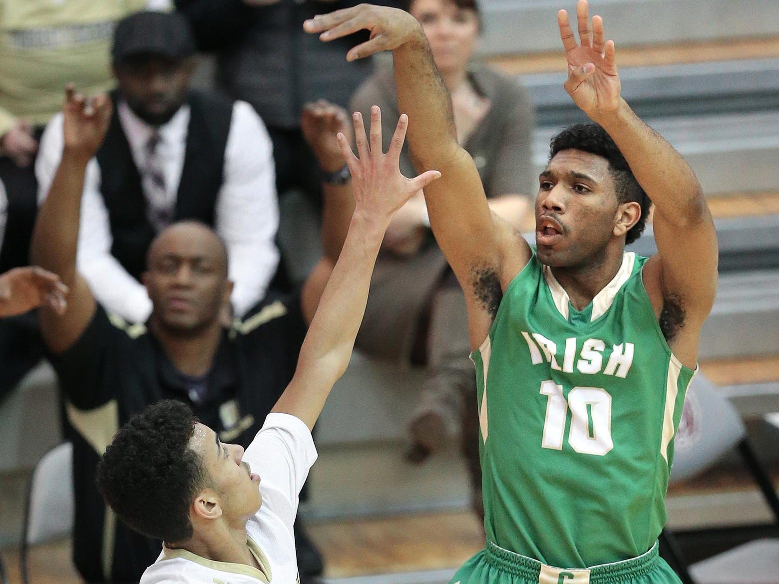 Cathedral's Eron Gordon sinks one of his 31 points over Warren Central's Bishop Smith during the IHSAA Boys Basketball Sectional #10 held at Lawrence Central High School on Tuesday, Mar. 3, 2015. Cathedral won 72-65.