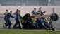 Safety workers work to extricate Austin Dillon from