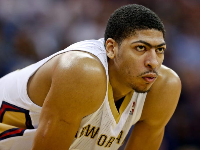 Pelicans forward Anthony Davis, along with his infamous unibrow, has emerged as one of the brightest young players in the NBA. Flip through this gallery to see how he got here.