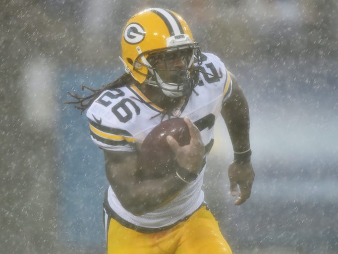 Green Bay Packers running back DuJuan Harris (26) runs with the ball against the Tennessee Titans during the first half at LP Field. Mandatory Credit: Don McPeak-USA TODAY Sports