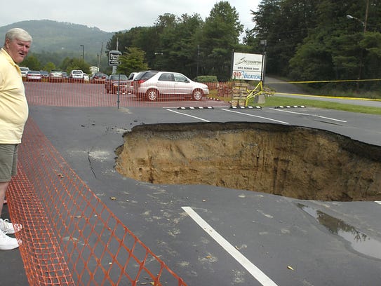 A sinkhole opened up in the parking lot of the Asheville