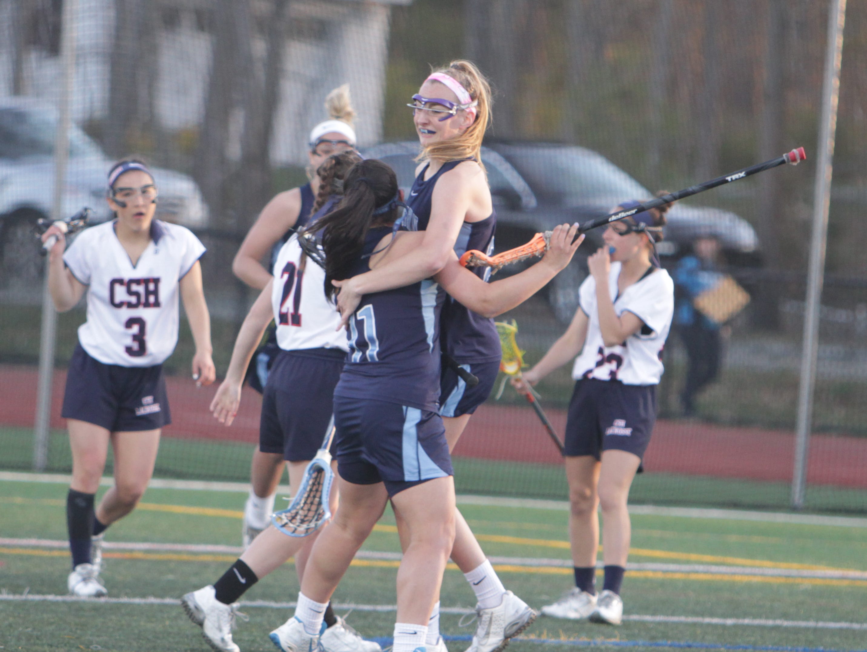Action during a girls lacrosse game between Suffern and Cold Spring Harbor in the Gains for Brains Lax Showcase at Cold Spring Harbor High School on Saturday, April 16th, 2016. Cold Spring Harbor won 13-11.
