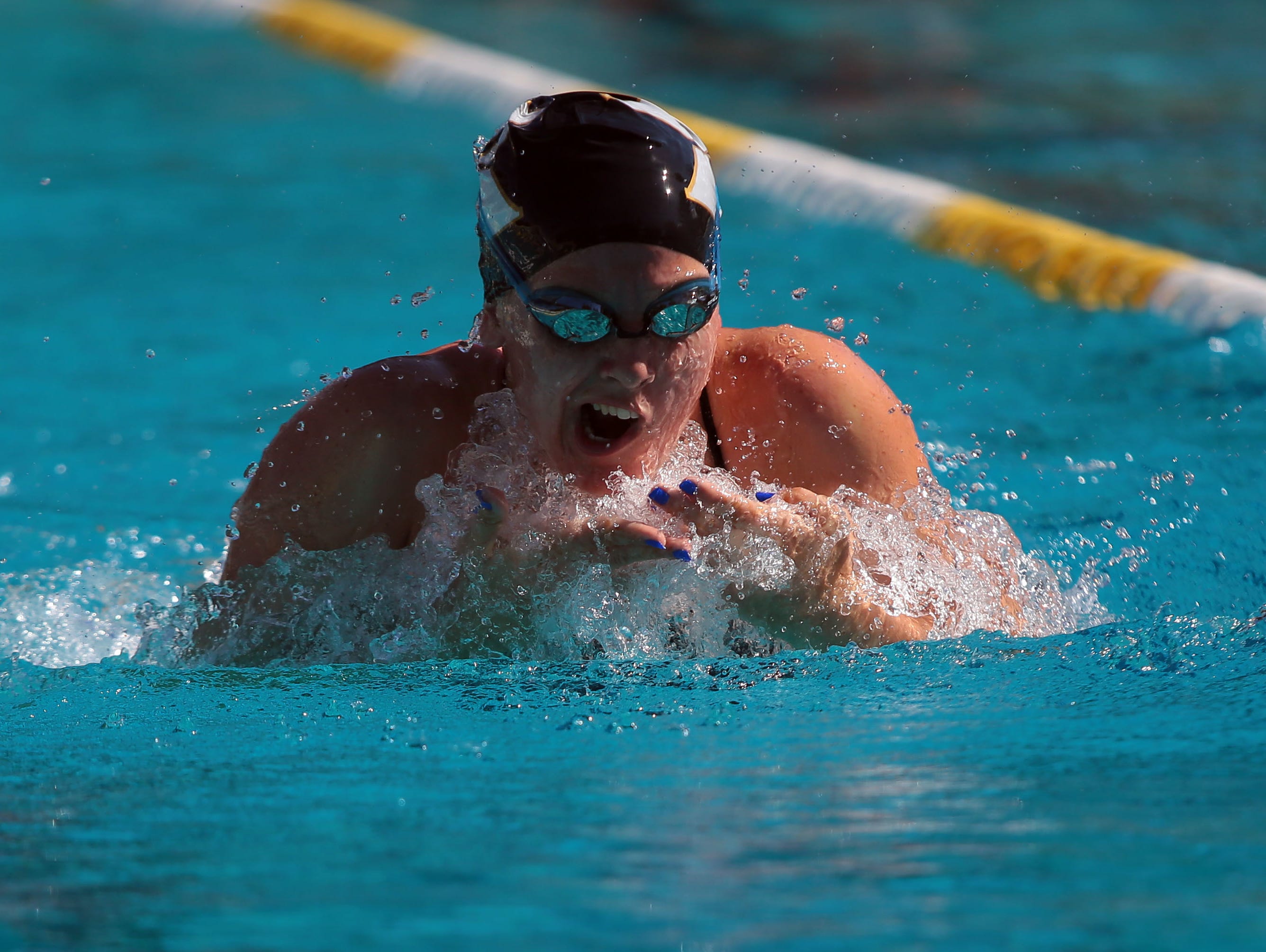 Xavier's Erin Fleet competes in the 200 individual medley on her way to an event win as Palm Springs hosts Xavier in a high school swim meet on Monday, April 25, 2016, at the Palm Springs Swim Center.