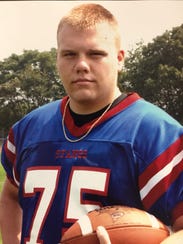 Colin Riebel on the football field while in high school.