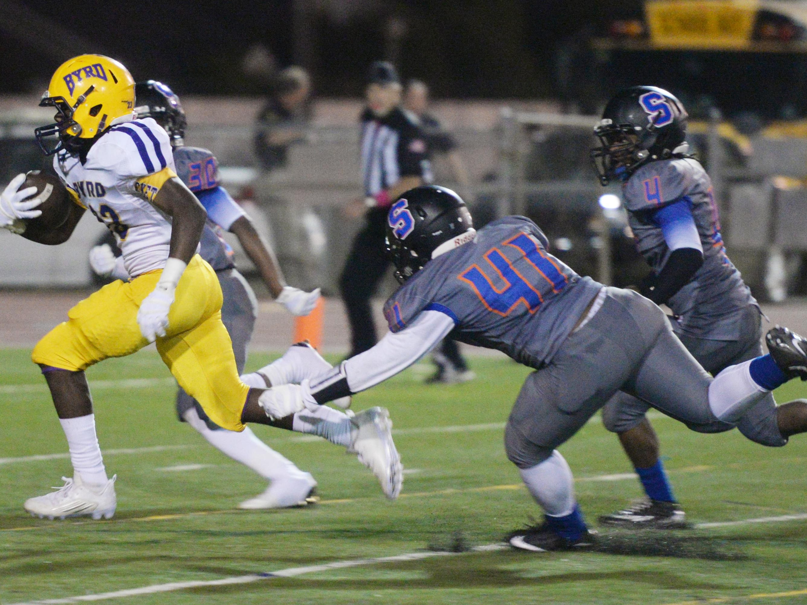 Byrd's Javier James (23) runs past Southwood's defense for a touchdown during Friday’s District 1-5A game at Lee Hedges Stadium.