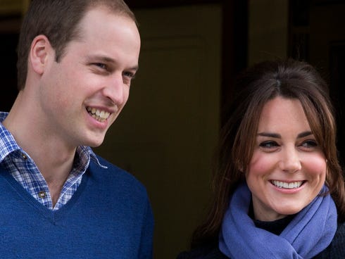 Britain's Prince William stands next to his wife Kate, duchess of Cambridge, in 2012.
