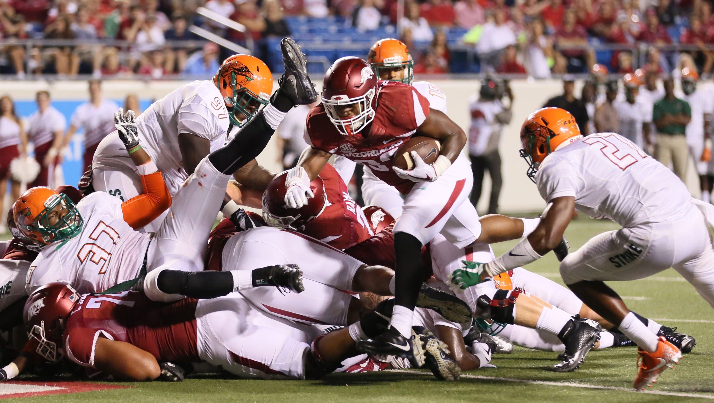 Arkansas weighs history and money in decision to stay or leave games in Little Rock