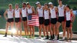 The men's eight of the United States pose for a photo
