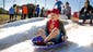 Kase Knussman sleds down a hill with 30,000 lbs. of