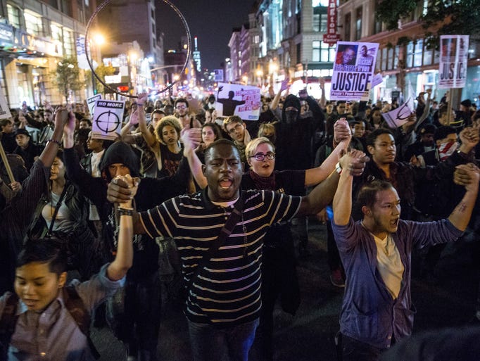Protesters march through the streets of New York after