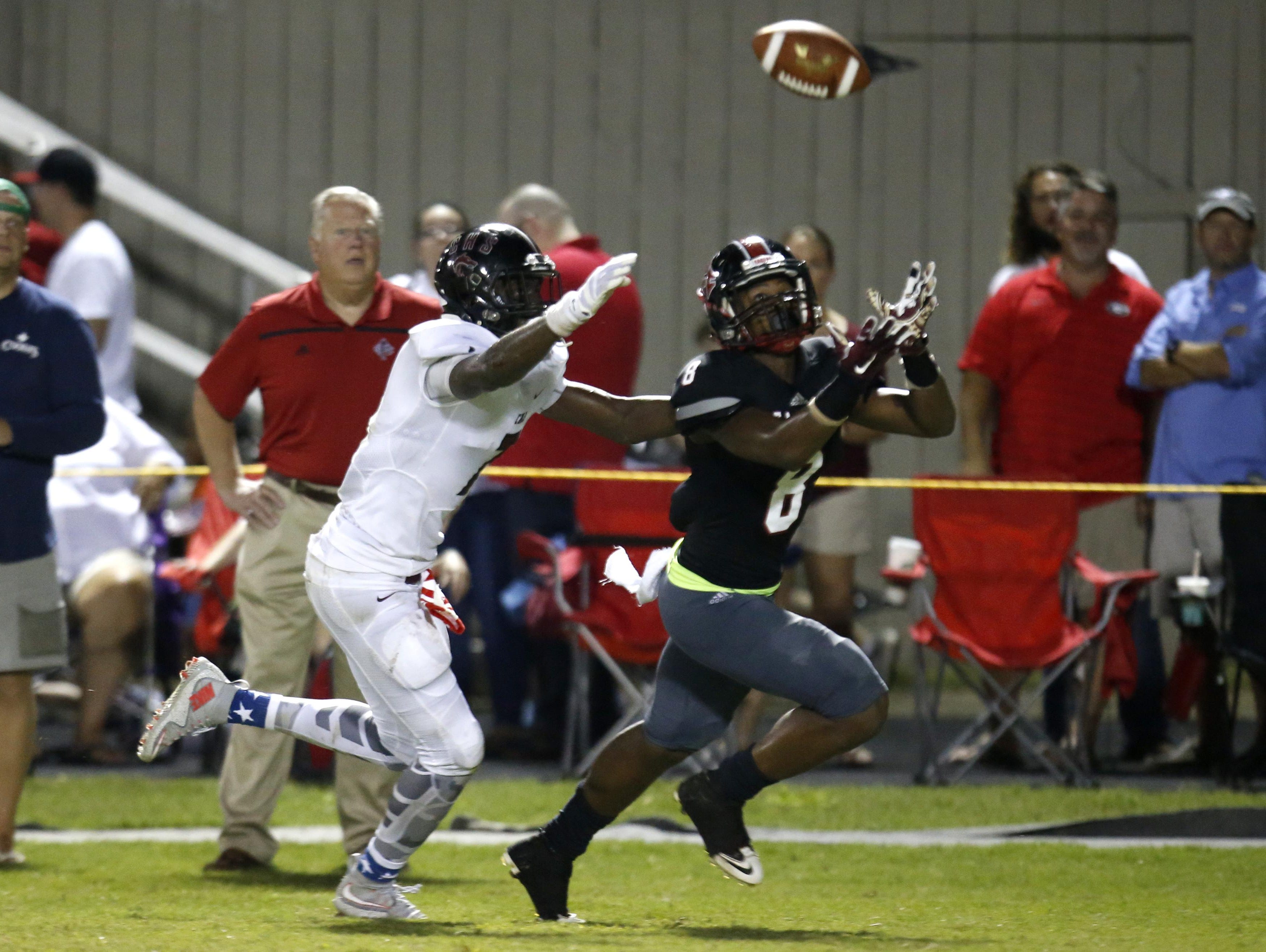 NFC defender Armunz Mathews gets in front of Chiles' wide receiver John Mitchell as they both attempt to make a play on the ball during their game at North Florida Christian on Friday.