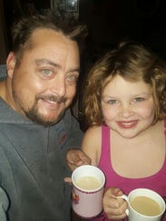 Michael Reed with daughter Lily, 9. Lily is missing