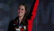 Missy Franklin participates in the medal ceremony for