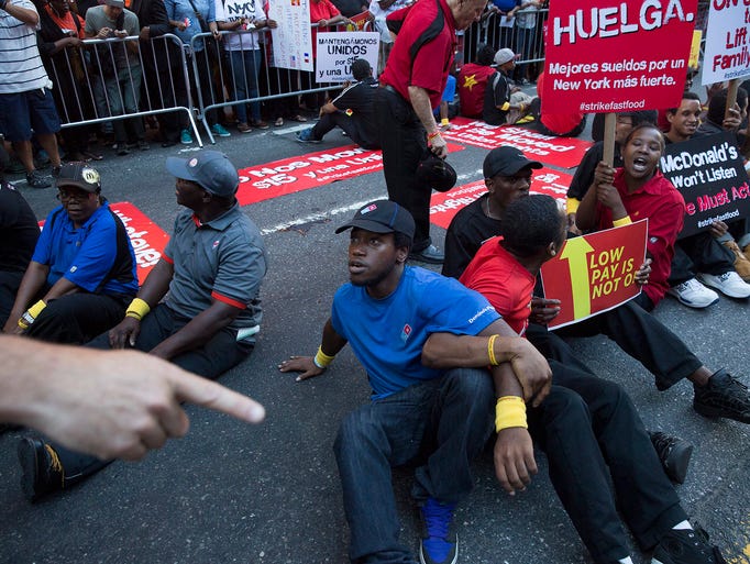 Demonstrators obstruct traffic on 42nd Street.