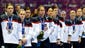 USA listens to the Canadian national anthem after the women's ice hockey gold medal game against.