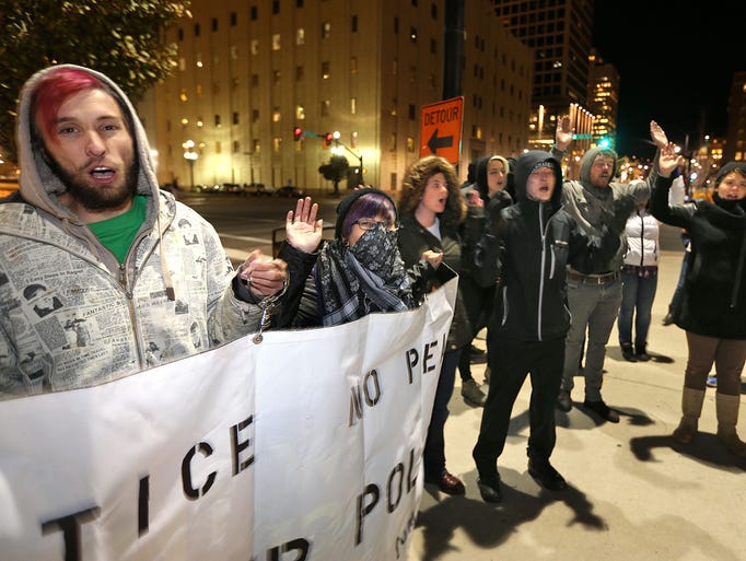 People protest in downtown Salt Lake City on the grand