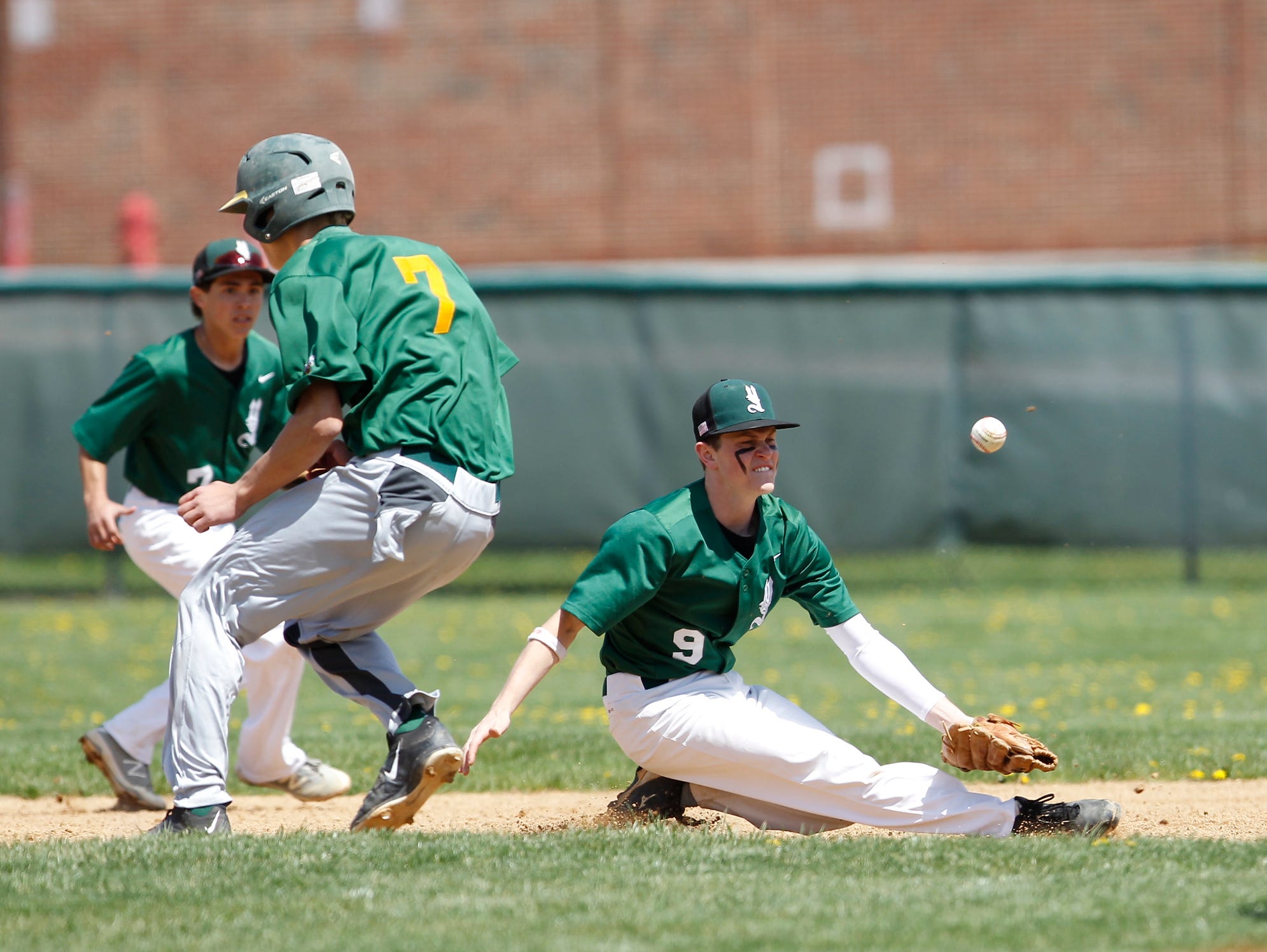 Lakeland's Trevor McCarthy (7) is safe at second as Yorktown second baseman Trevor Boclan (9) reaches for the throw during a varsity baseball game in Yorktown High School on Saturday, April 23, 2016.