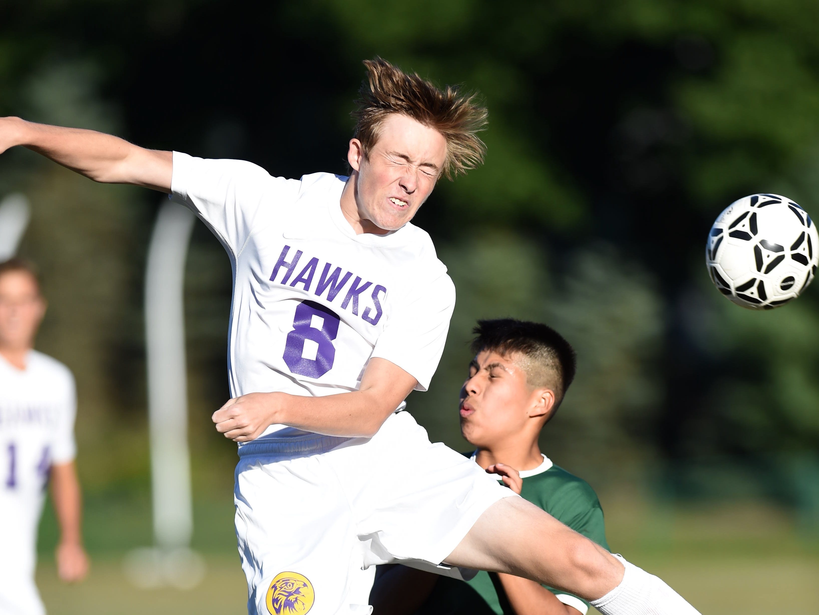 Rhinebeck's Nate Shanahan goes up for a header against Webutuck's Omar Reyes during Thursday's game at Rhinebeck.