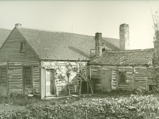 A hostoric photo of Mackinac Island's Biddle House,