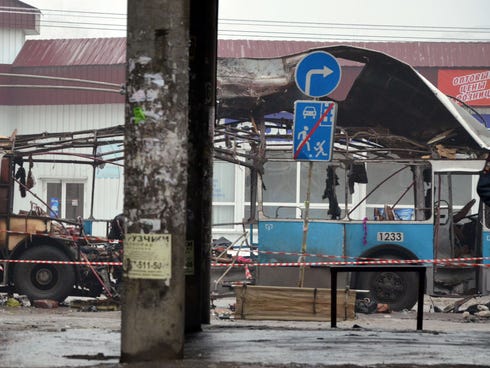 A destroyed trolleybus stands on a street in Volgograd on Monday after 10 people were killed in a bombing on the packed vehicle.