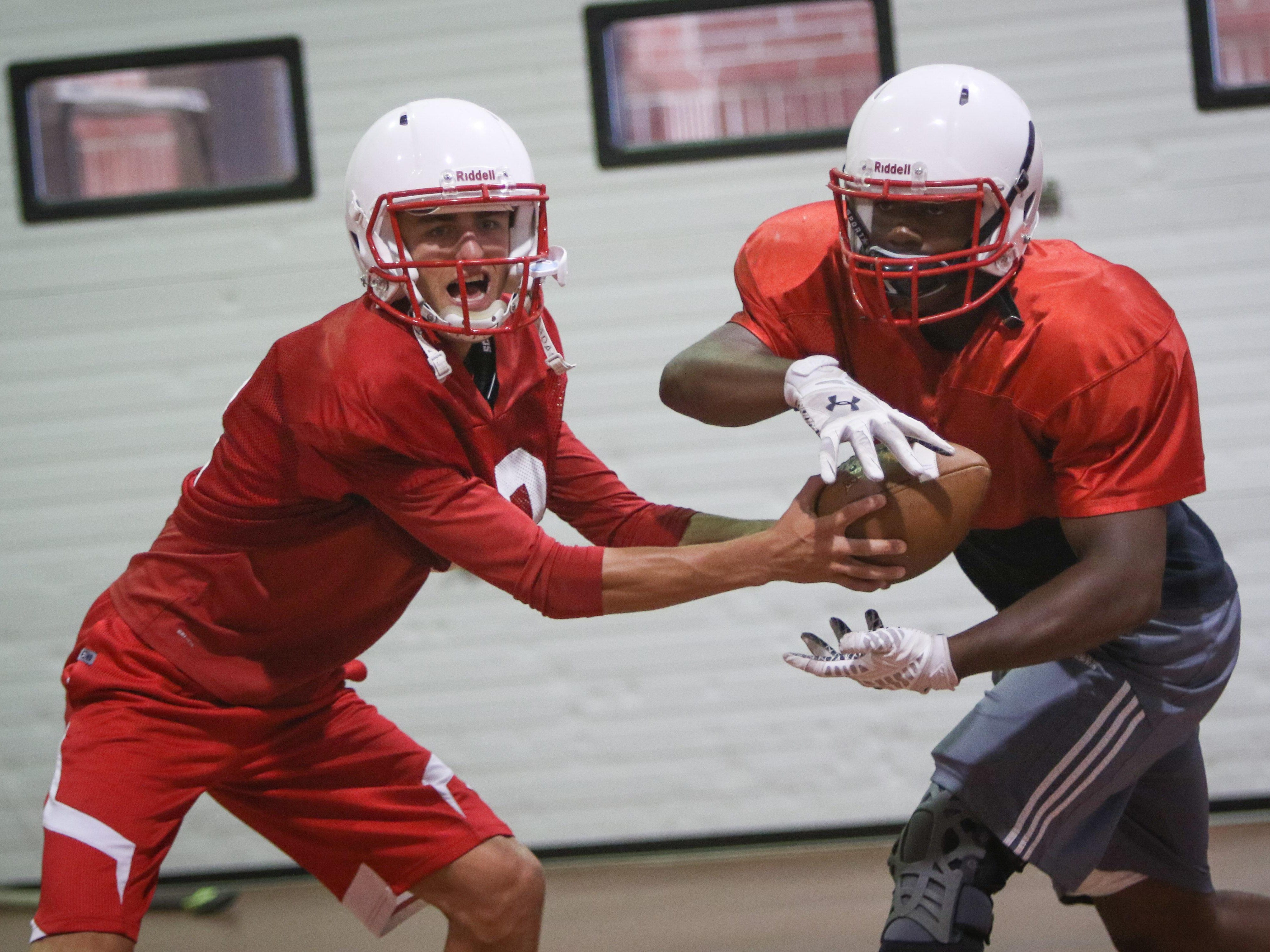 Quarterback Nolan Henderson and running back Will Knight lead a high-powered Smyrna offense against Salesianum on Friday night.