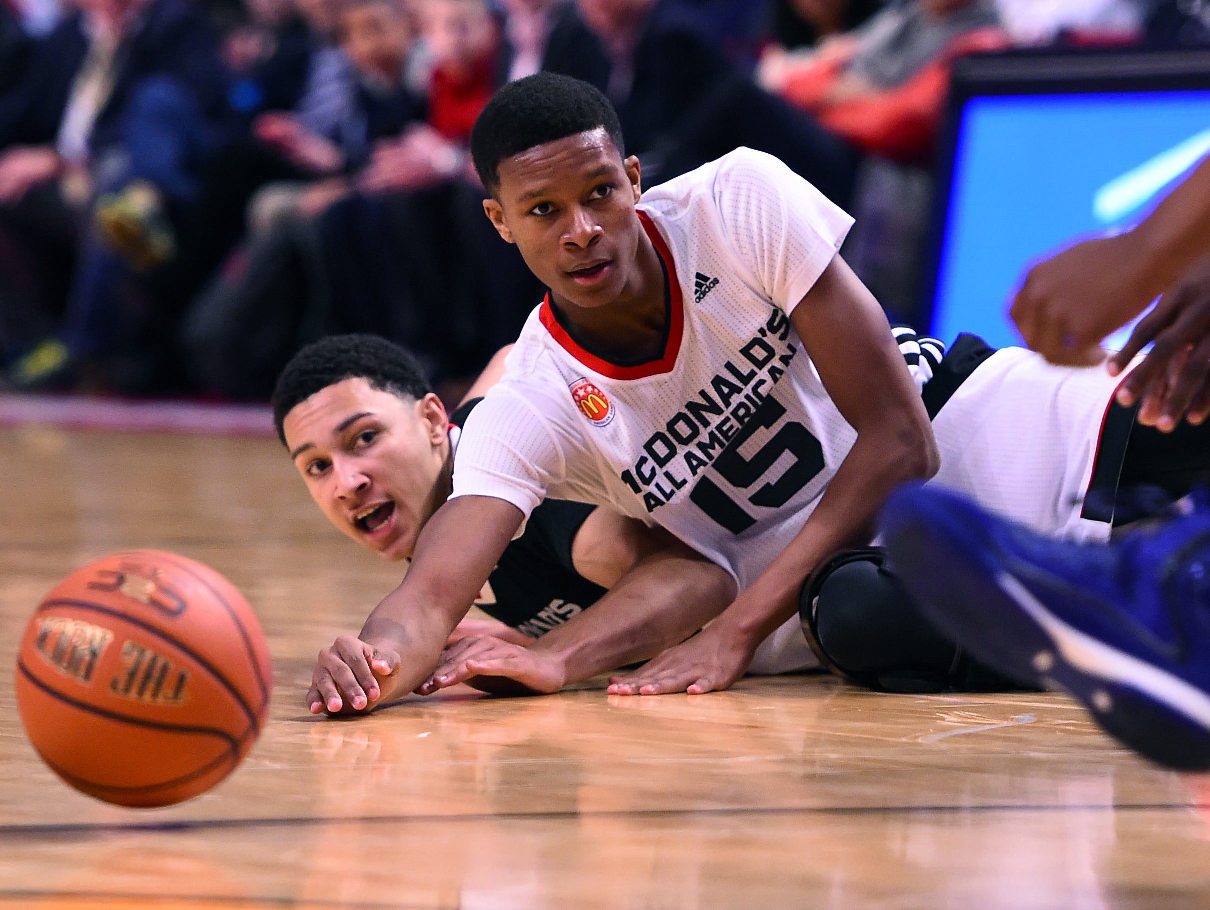 Apr 1, 2015; Chicago, IL, USA; McDonald's All American West guard PJ Dozier (15) dives for a loose ball against the McDonald's All American East during the second half at the United Center. Mandatory Credit: Mike DiNovo-USA TODAY Sports