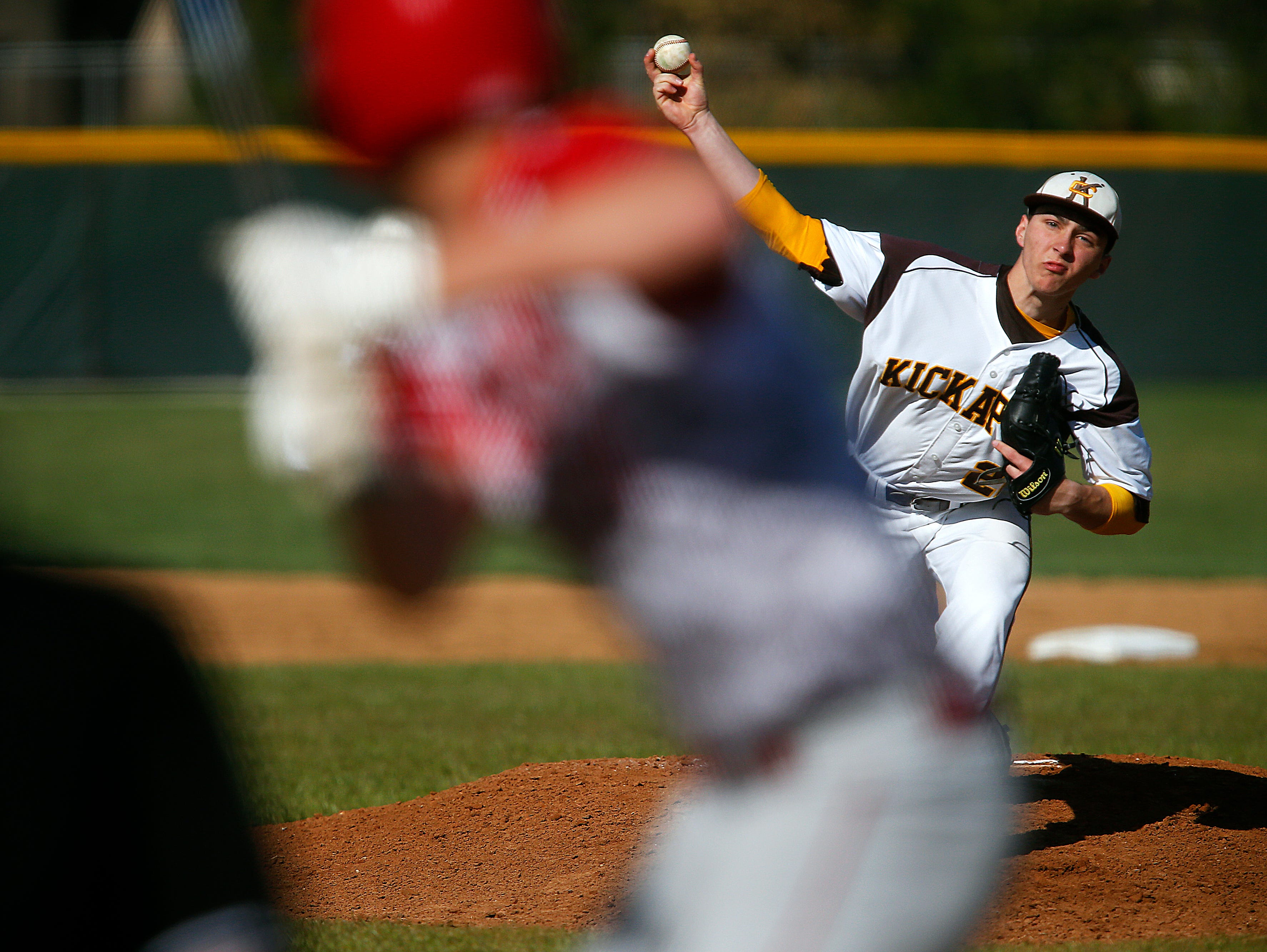 Kickapoo High School pitcher Kaleb Schmidt (22) pitches during first inning action of the high school baseball game between Kickapoo and Ozark at Kickapoo High School in Springfield, Mo. on March 29, 2016.