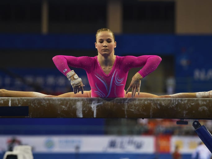 Madison Kocian of the USA performs on the beam during the women's qualification at the world championships in Nanning, China, on Sunday.