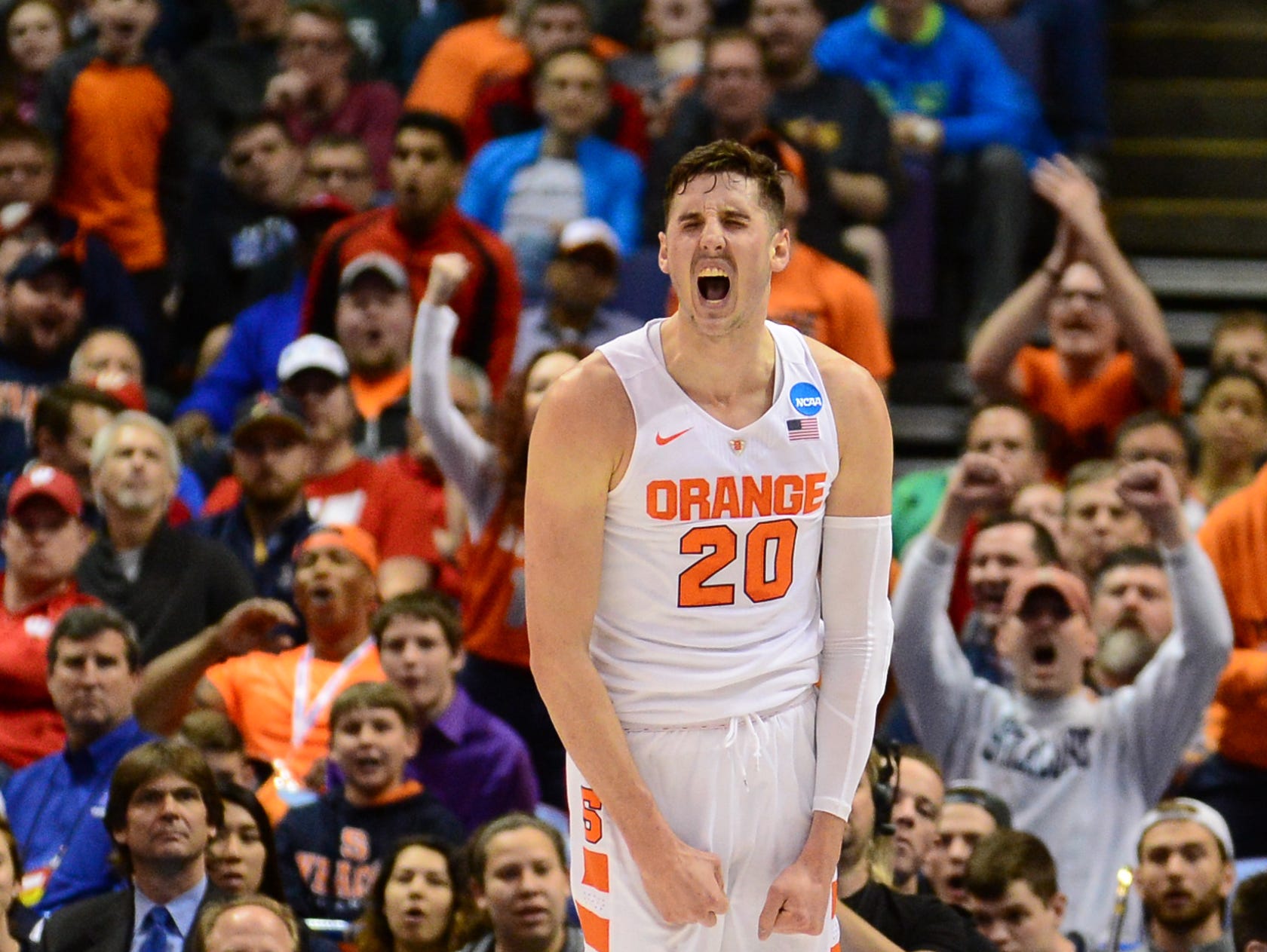 Syracuse's Tyler Lydon reacts to a dunk against Middle Tennessee at Scottrade Center in St. Louis, Missouri Sunday.
