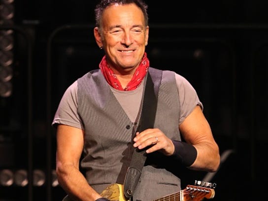 Bruce Springsteen and the E Street Band is seen performing