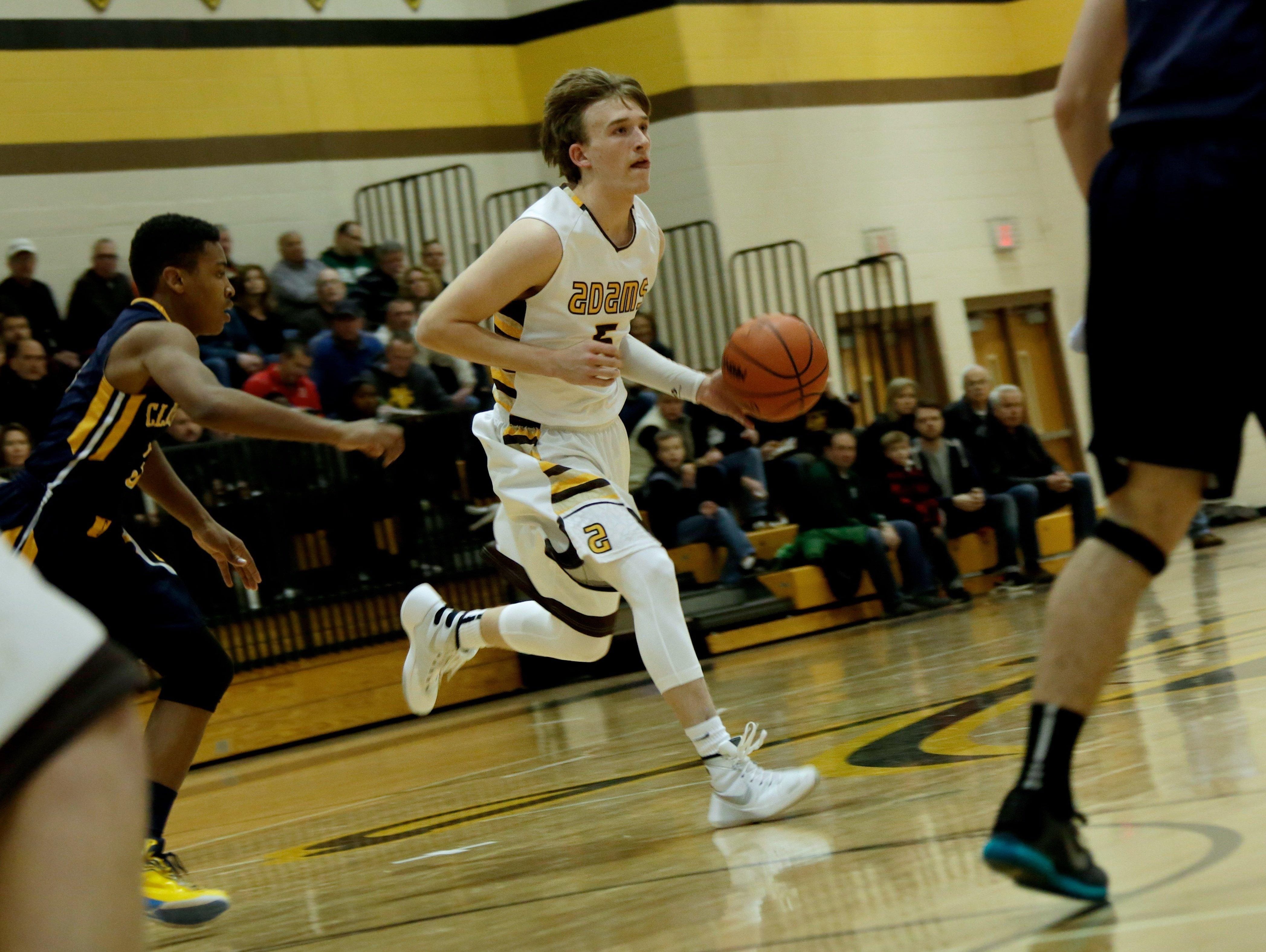 Rochester Adams’ Spencer Littleson has moved from shooting guard to point guard.