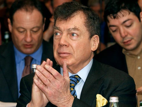 Edgar M. Bronfman applauds a speaker while attending the Plenary Assembly of the World Jewish Congress assembled in a hotel in Belgium in 2005.