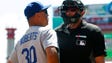 Los Angeles Dodgers manager Dave Roberts (30) talks