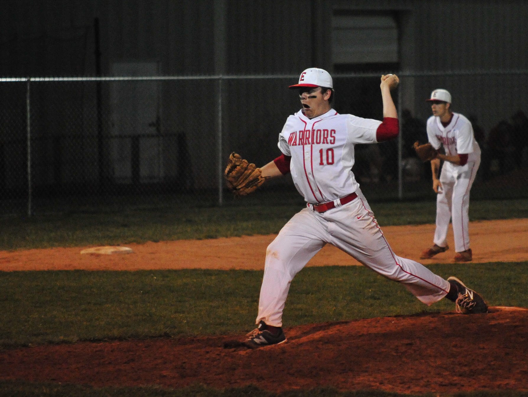 Recent Erwin graduate Tanner Hall pitches during a March game. The Warriors will have a new coach (Caleb Harbin) for the 2017 season.