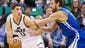 Utah Jazz center Enes Kanter (0) is defended by Golden State Warriors center Andrew Bogut (12) during the first half at EnergySolutions Arena.