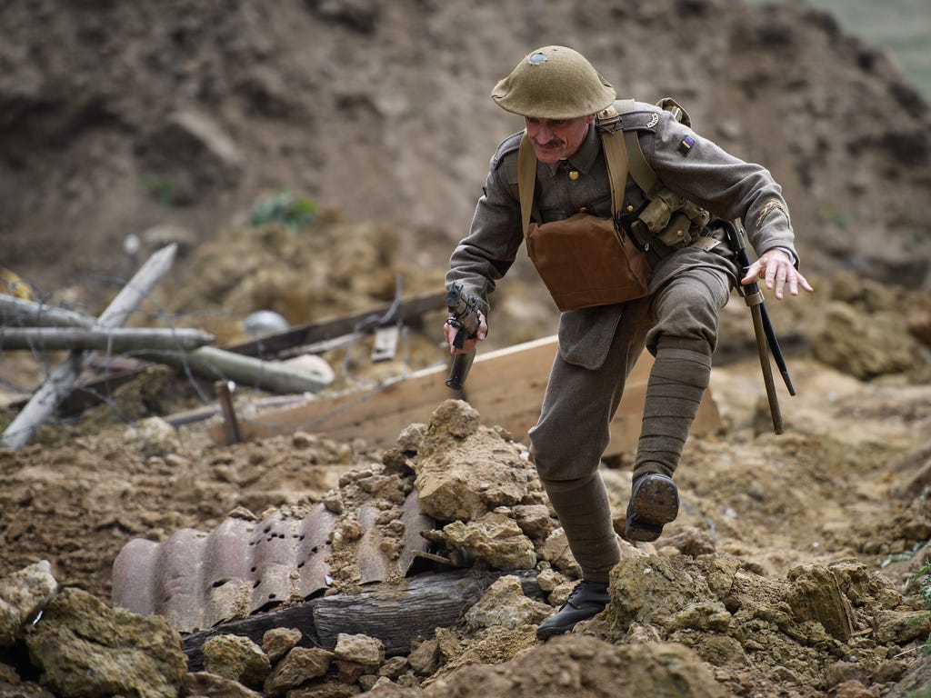 Actors recreate the battle of Passchendaeale in Ypres, in the Ypres Salient battlefields area of Belgium. Dignitaries and descendants of those who fought gathered to mark the centenary of Passchendaele, the third battle of Ypres.  The campaign saw in
