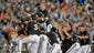 Vanderbilt players celebrate a 3-2 win over Virginia at the College World Series at TD Ameritrade Park in Omaha, Neb., Wednesday, June 25, 2014.