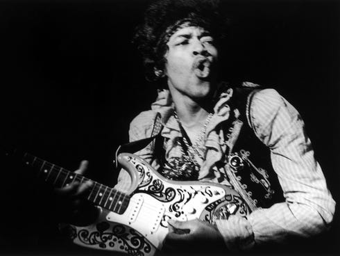 Jimi Hendrix performs with the Jimi Hendrix Experience at Monterey (Calif.) International Pop Festival on June 18, 1967.