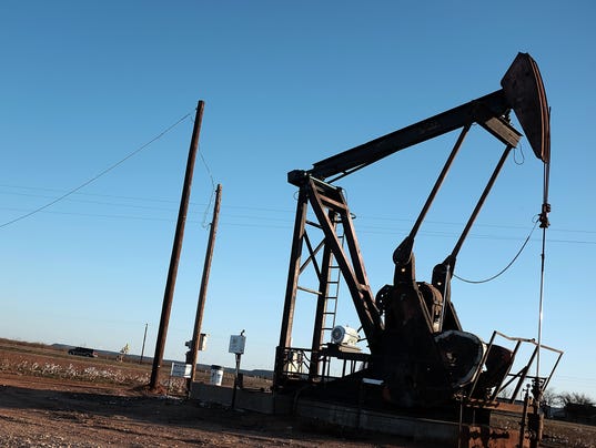 Crashing oil prices decimate Texas boomtowns 635888951427820551-texas-oil-hurt