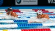 Michael Phelps (right) and Ryan Lochte swim during