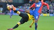Watford defender Miguel Britos vies for the ball with