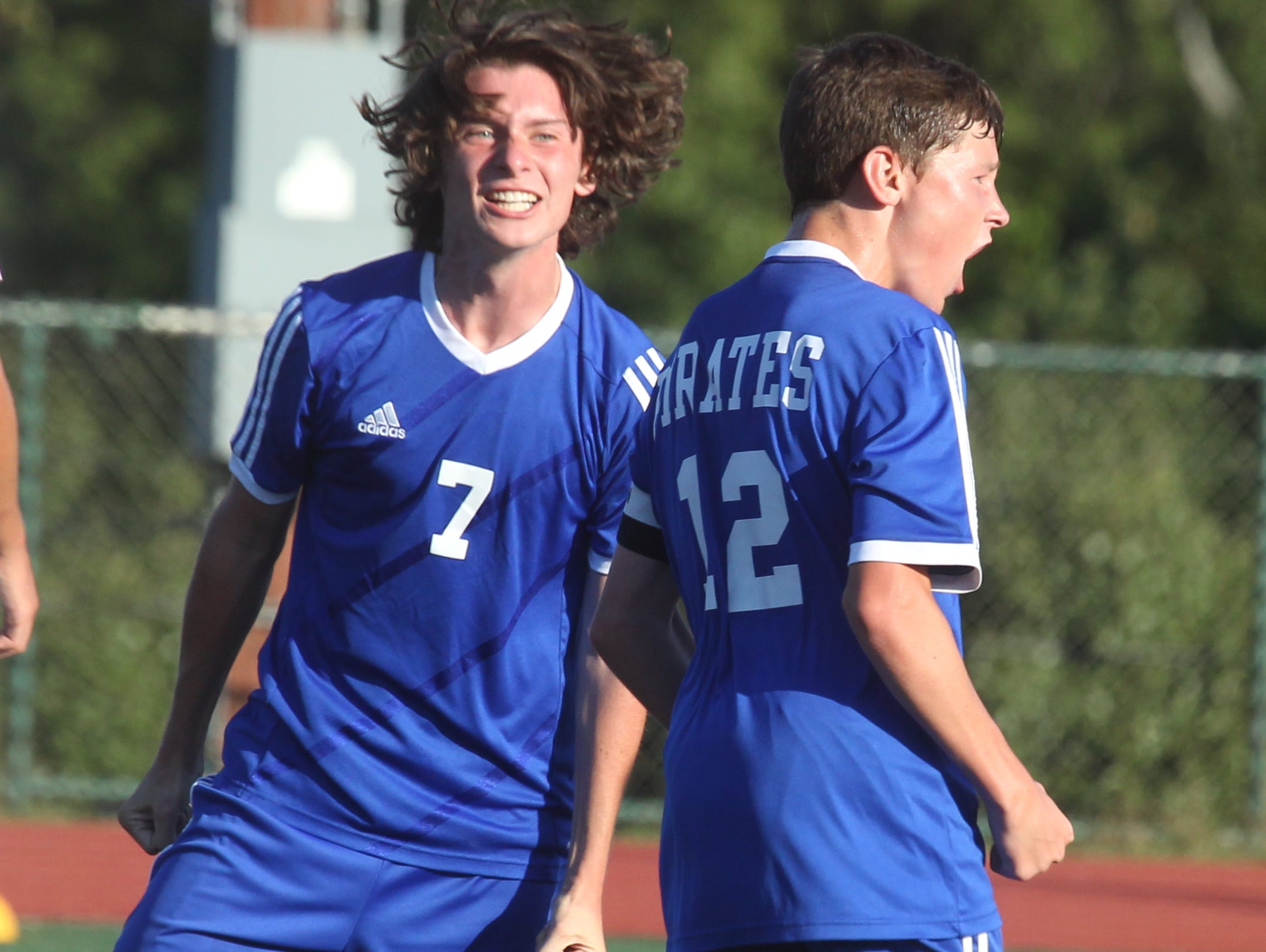 Pearl River's Brian Flaherty, left, and Jake Kurzhals celebrate Kurzhals' goal during a game at Tappan Zee Sept. 24, 2015. Pearl River won1-0.