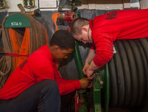 Aviation Boatswain's Mate (Handling) Airman W. Young,