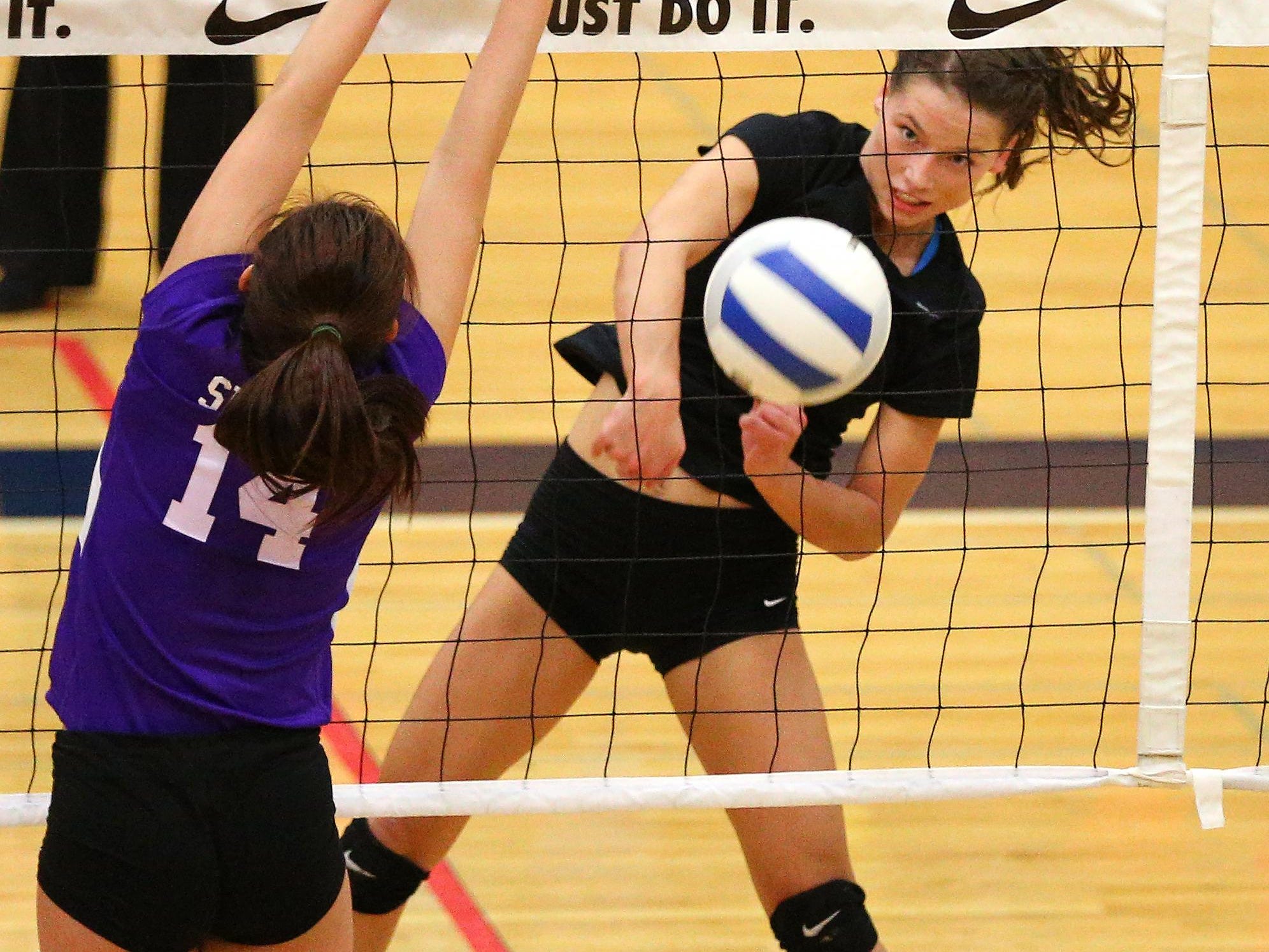 West Salem's Kasey Campbell (2) with a kill against Sunset during the fourth place gameof the 6A state volleyball playoffs, Saturday, November 7, 2015, at Liberty High School in Hillsboro, Ore. West Salem lost 3-2 to place sixth.