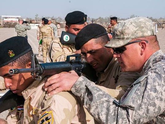 تدريبات الجيش العراقي الجديده على يد المستشارين الامريكان  635568462766570126-DFN-Iraq