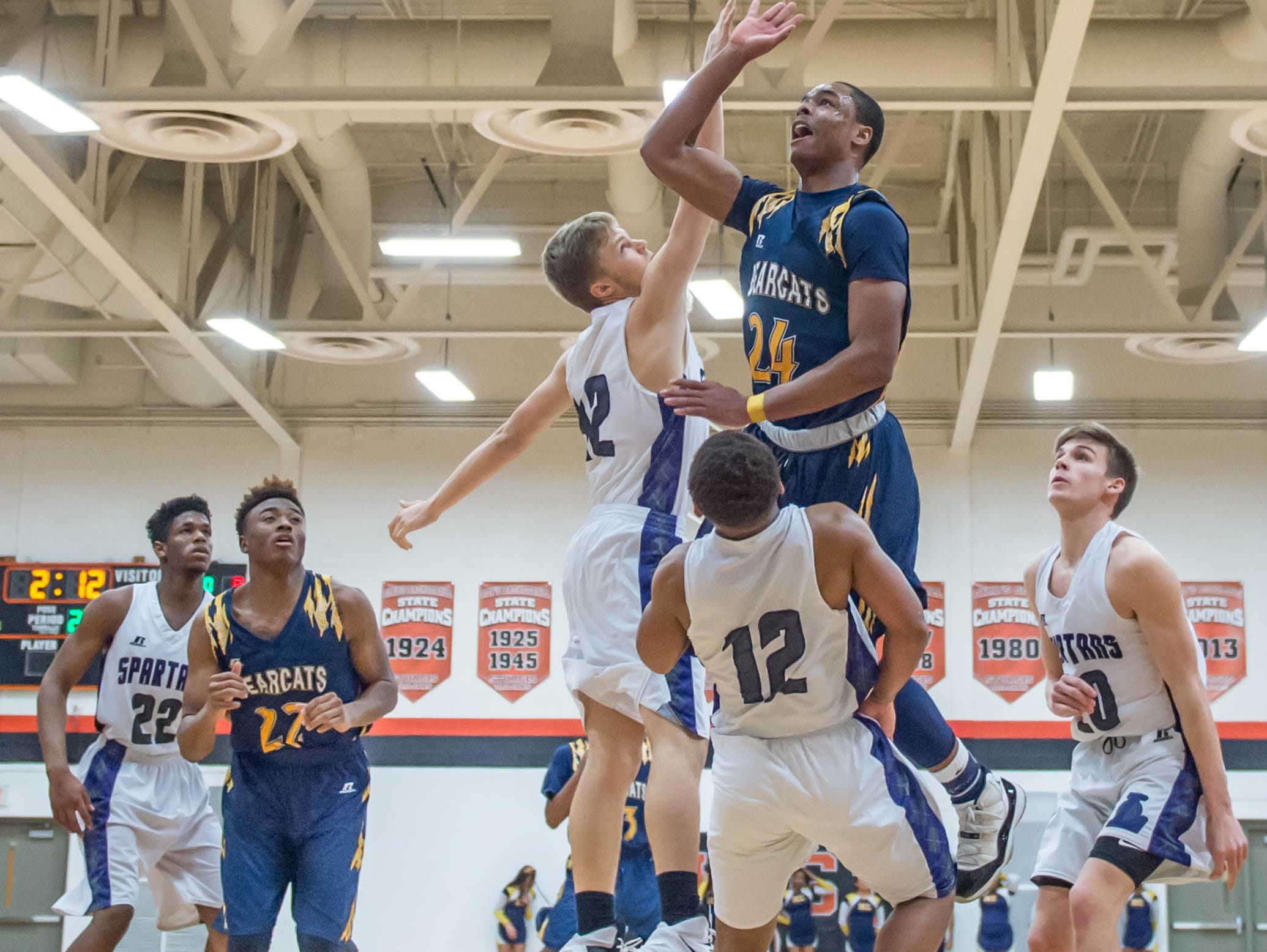 Battle Creek Central's Cyntell Williams (24) goes for the hoop against Lakeview Wednesday night.