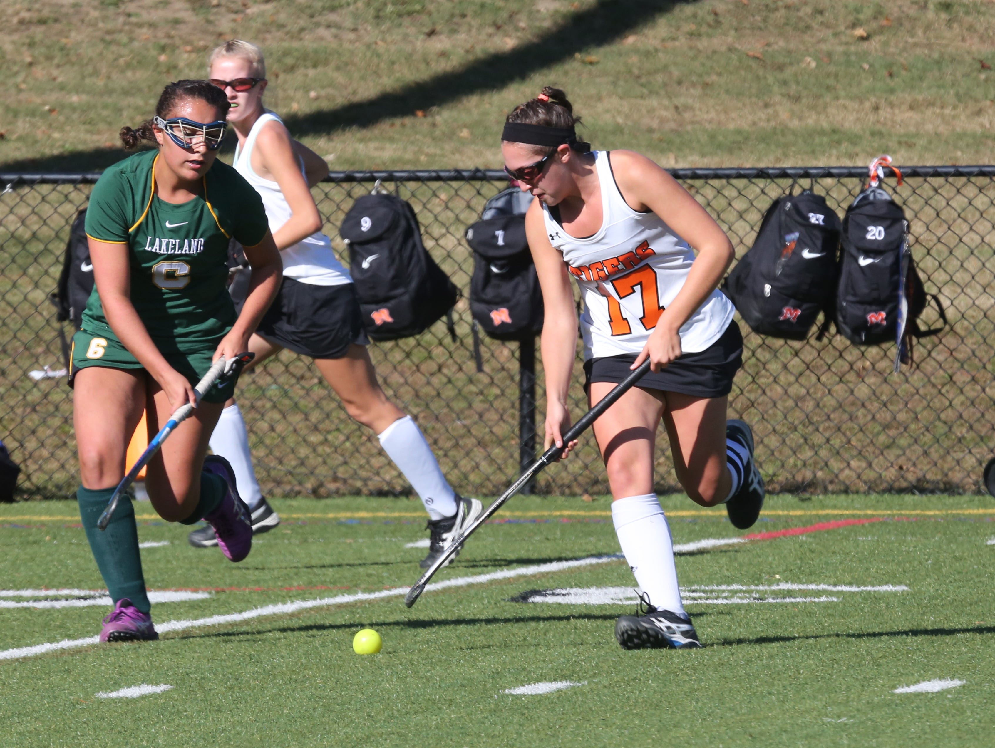 Lakeland's Emily Kness, left, and Mamaroneck's Paige Danehy chase down a ball during their game in Mamaroneck Saturday.