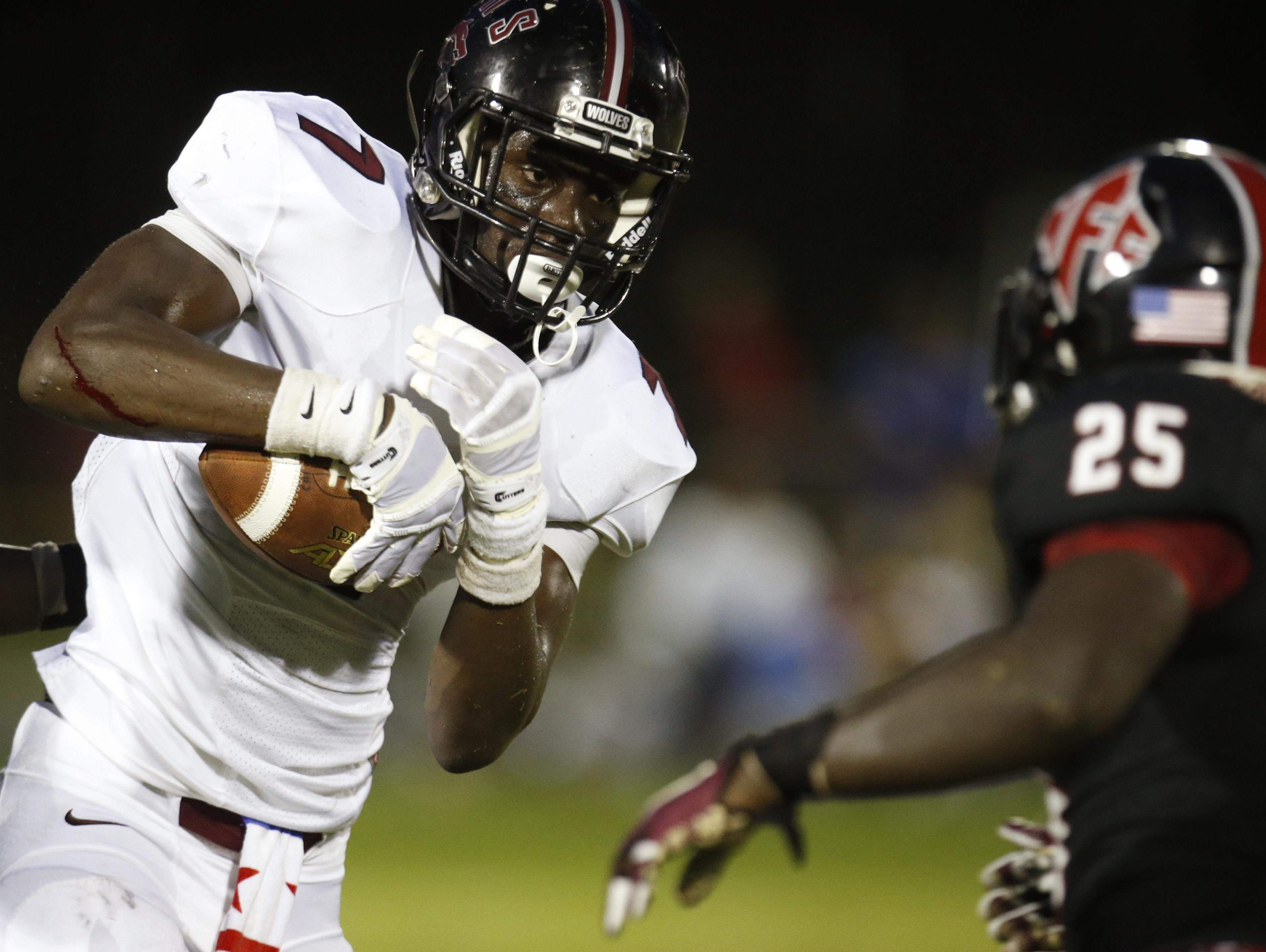 Chiles receiver John Mitchell runs after catching a pass during the T’wolves’ win at NFC. Mitchell caught six passes for 61 yards and a 33-yard touchdown in the third quarter of a 17-7 win.